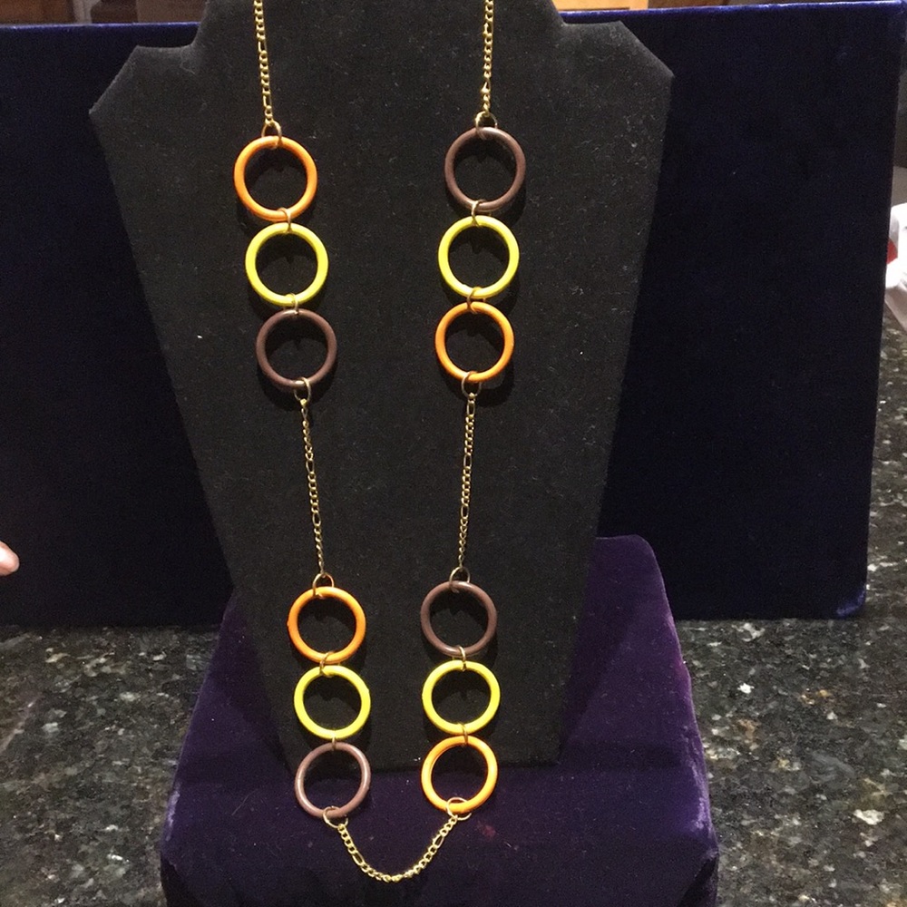Long chain with yellow, orange and brown circles